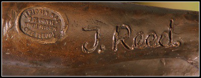 Stamp of the foundry and J. Reed in the bronze